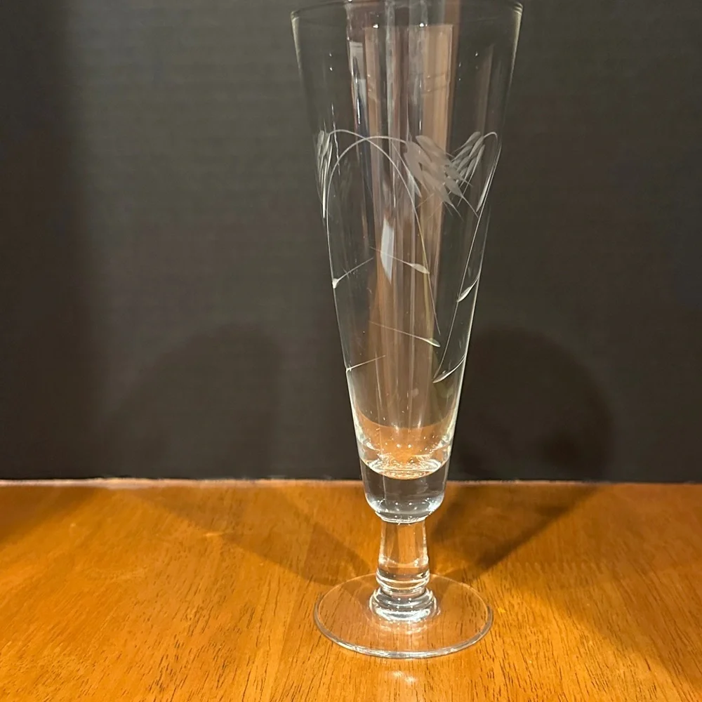 Sasaki Clear Glass Pilsner or Champagne Flute, in the Etched Wheat Pattern.